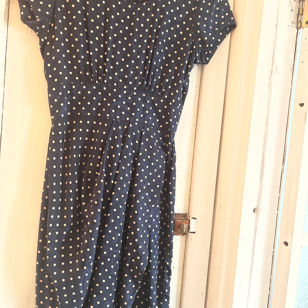 100% silk, vintage 80s tulip dress. Navy blue with white polkadots.